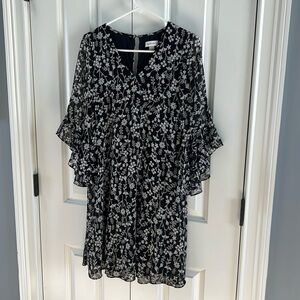 Calvin Klein size 6, dress with mid sleeve black with gray flowers